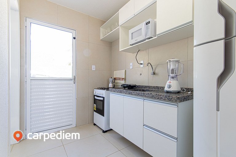 Duplex equipado no Beach Town House IV por Carpediem