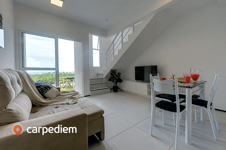 Tríplex no Beach Town House em Porto das Dunas por Carpediem