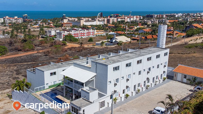 Tríplex no Beach Town House em Porto das Dunas por Carpediem