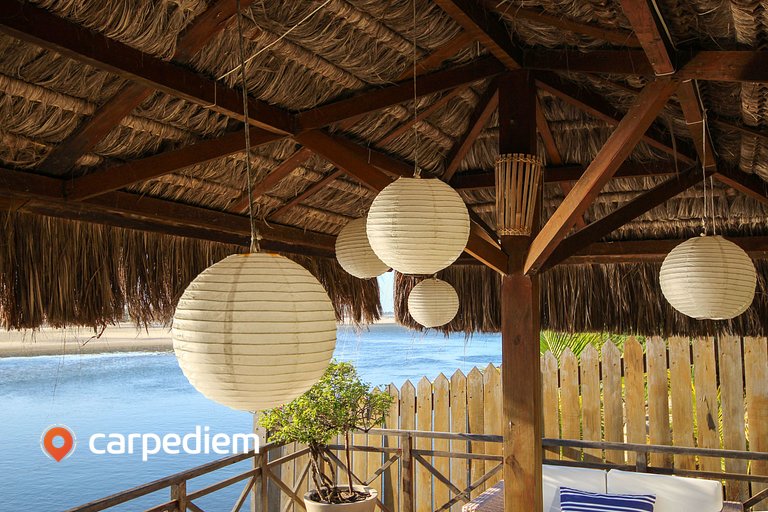 Casa Pé na areia na Praia de Genipabu por Carpediem