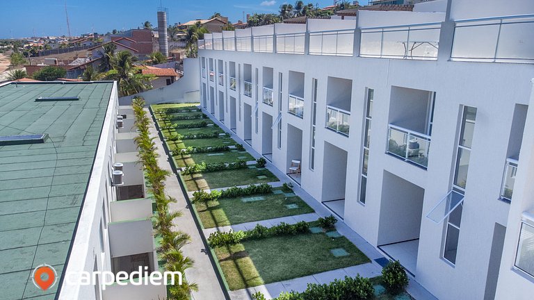 Casa tríplex com Jacuzzi em Porto das Dunas por Carpediem